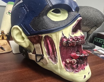 3d printed, hand painted OVERSIZED Zombie Capt America helmet.  Can be worn as the helmet is connected together via magnets.