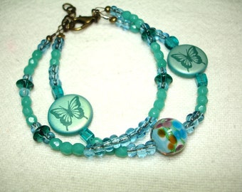 Shimmery Butterfly Bracelet - Blue Green Glass Butterfly Beads - Round Glass Flower bead -