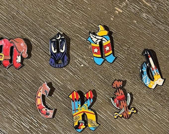 Magic kingdom letters mystery set pins 7 Disney trading pins