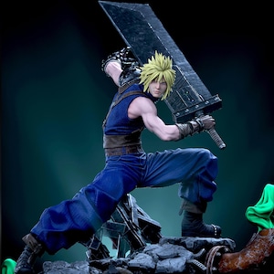 May include: A detailed figurine of a spiky-haired character in a blue sleeveless top and blue pants, wielding a massive, oversized dark gray sword over their shoulder. The character stands in a dynamic combat pose atop a pile of gray rubble.