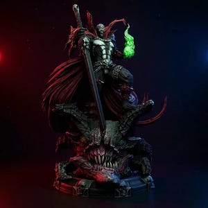 May include: A detailed statue of the comic book character Spawn, standing atop a monster base. The figure is clad in a black and white suit with a red cape, holding a large sword and a green flame. The base is dark with sharp teeth.