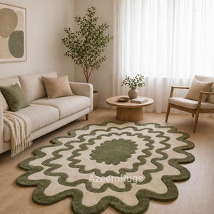 Alfombra de lana tejida a mano de 5x7 pies con borde festoneado verde.