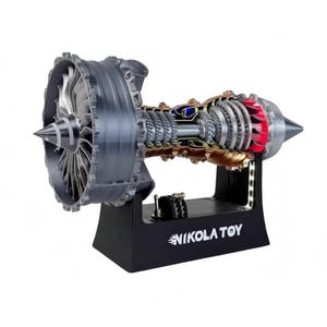 May include: A detailed model of a jet engine, showcasing internal components. The engine is gray with red and blue accents, mounted on a black stand. The stand features the text "NIKOLA TOY".