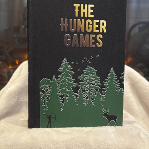 Libro rilegato a mano - Hunger Games di Suzanne Collins - design originale - pezzo unico