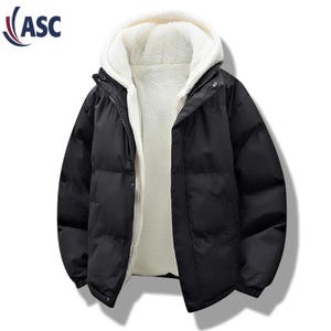May include: Black puffer jacket with a white, fluffy, hooded lining. The jacket has a zipper closure and a logo in the upper left corner. The jacket is designed for warmth and protection from the elements.