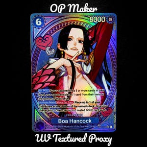 May include: A holographic trading card featuring Boa Hancock from the Seven Warlords of the Sea. The card has a blue and purple background with the text "OP Maker" and "UV Textured Proxy". The card's text includes "8000" and "6".