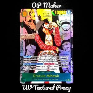 May include: A white ceramic mug with a black handle and the text "But First, Coffee" in a bold, black font. The mug is set against a blurred background, suggesting a cozy setting.