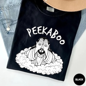 peekaboo jesus, funny jesus shirt, christian humor tee, jesus meme shirt, faith graphic tee, religious funny tee, cute christian tee, church humor shirt, bible humor tee, jesus gift idea, faith based shirt, christian gift tee, gospel humor tee