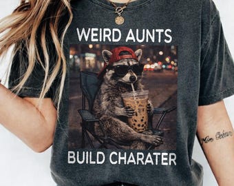 Comfort Colors® Weird Aunts Build Character Shirt, Funny Aunt Shirt, Cool Aunt Gift, Chaos Aunt Tee, Iced Coffee Raccoon Shirt, DTG print