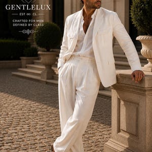 May include: A man in a white linen suit, including a jacket, shirt, and pleated pants, leans against a stone pillar. The suit is paired with brown leather loafers. The image includes the logo "GENTLELUX" and the text "CRAFTED FOR MEN DEFINED BY CLASS."