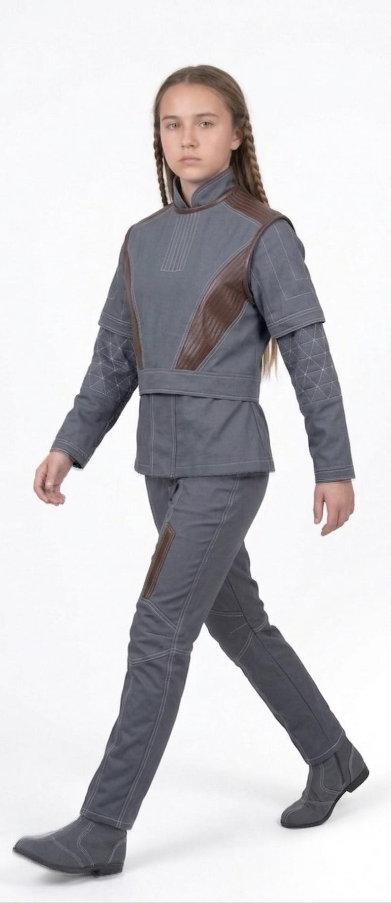 May include: A set of three ceramic nesting bowls in graduating sizes. The bowls feature a speckled, off-white glaze with a slightly textured surface. Each bowl has a rounded shape and a simple, minimalist design.