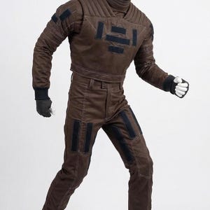 May include: A rustic wooden sign with the text "Welcome to our home" in white lettering. The sign features a distressed finish and a simple, inviting design, perfect for a front porch or entryway.