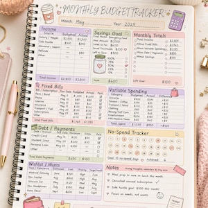 May include: A spiral-bound monthly budget tracker planner page with sections for income, savings goals, fixed bills, variable spending, debt payments, a no-spend tracker, and a wishlist. The page features pastel colors, icons, and handwritten text.