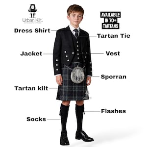 May include: A young person in a traditional Scottish outfit, featuring a black jacket, vest, and tartan kilt. The ensemble includes a dress shirt, tartan tie, sporran, socks, and flashes. The image text states availability in over 70 tartans.