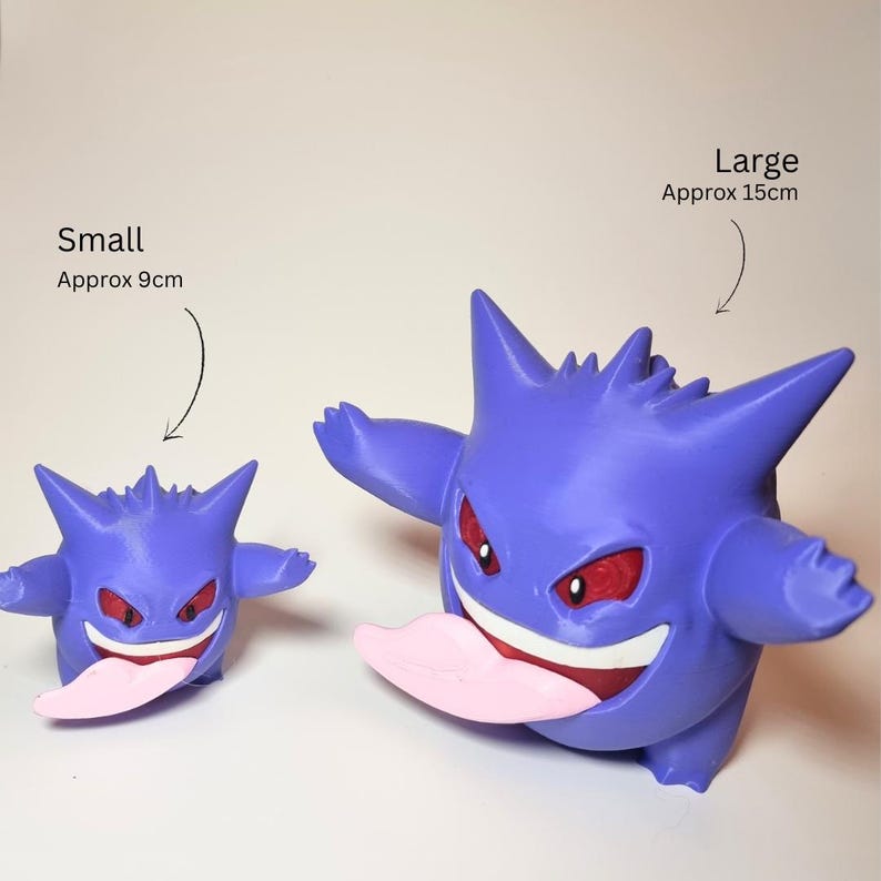 May include: Two purple Gengar figures with red eyes and pink tongues. The small figure is labeled as approximately 9cm, and the large figure is labeled as approximately 15cm. Both figures feature pointed ears and rounded bodies with outstretched arms.