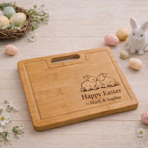 May include: A set of three ceramic mugs with a speckled, matte finish. The mugs are in shades of cream, light grey, and dark grey. Each mug has a simple, minimalist design and a rounded handle. Ideal for tea or coffee.