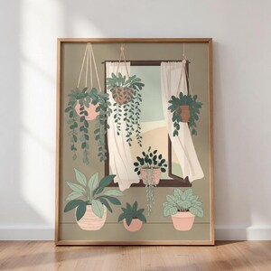 以下が含まれることがあります： 窓辺のシーンを描いた、吊り下げられた鉢植えの植物が特徴の額入りアートプリント。イラストは、緑、ピンク、茶色の落ち着いた色使いです。植物はさまざまな鉢やハンギングプランターに入っており、白いカーテンが風に吹かれています。