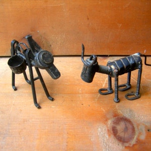 Vintage metal art, found objects, art, creatures animals airplane, mechanical toys