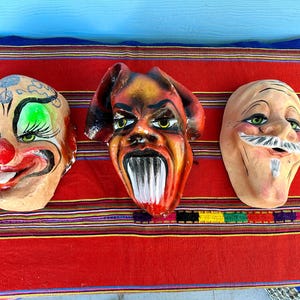 Vintage Peruvian carnival masks, festival masks, viejito, clown,