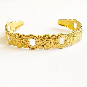 Hermosa pulsera con diseño floral Oneida dorada / Pulsera vintage ajustable / Pulsera con diseño floral dorada