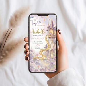 A person's hand holding a smartphone displaying a birthday invitation for a girl named Isabella.