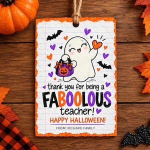 May include: A rectangular paper gift tag with a jagged orange border, featuring a cartoon ghost holding an orange heart and a pumpkin bucket. The text reads: thank you for being a FABOOLOUS teacher! HAPPY HALLOWEEN! FROM: RICHARD FAMILY.