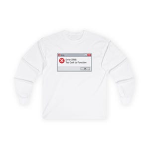 May include: White long-sleeve shirt featuring a computer error message graphic. The graphic reads "Error 2000: Too Cool to Function" in a window-like design with a red "X" symbol. The shirt is made of a soft, comfortable material.