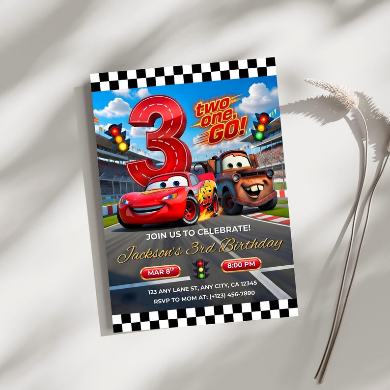 Lifestyle mockup of the Cars racing invitation placed on a neutral surface next to a decorative dried branch. Highlights the modern and professional graphic design for a boy’s third birthday party.