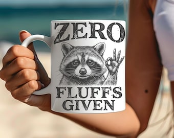 Taza "Zero Fluffs Given", taza de café divertida con mapache, taza con humor sarcástico, taza divertida con animales, regalo para un amigo, taza con humor para la oficina.
