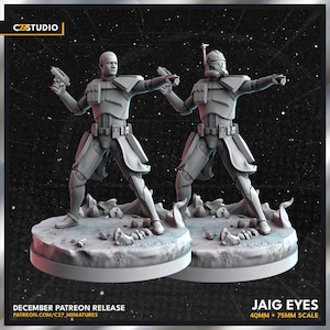 Op de afbeelding: Twee grijze miniatuurfiguren van soldaten in harnas, elk met een pistool en staand op een cirkelvormige basis. De figuren staan in actie, met één helm. Tekst op de afbeelding luidt "JAIG EYES 40MM + 75MM SCALE" en "DECEMBER PATREON RELEASE".