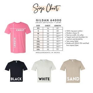 May include: A size chart for Gildan 64000 unisex softstyle t-shirts. The chart includes chest and length measurements in inches for sizes XS to 5XL. The image also shows a pink t-shirt, and three t-shirts in black, white, and sand colors.