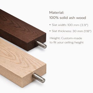 May include: Two wooden slats, one light and one dark, with metal dowels. The text states the material is 100% solid ash wood. Slat width is 3.9 inches, and the thickness is 1.18 inches. The height is custom-made.