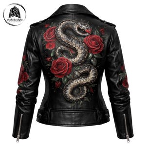 May include: Black leather jacket with a striking design of a snake and red roses on the back. The jacket has a classic biker style with a notched collar, zippered pockets, and a fitted silhouette. The sleeves also have rose detailing.