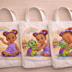 May include: Three white canvas tote bags with illustrations of a young girl in a purple dress with yellow stars. The girl is interacting with a green turtle and a teddy bear. A rainbow and bookshelf are in the background.