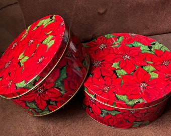 To vintage round tins red poinsettia design