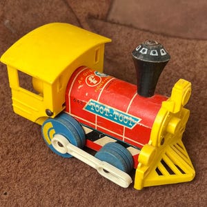 vintage TOOT-TOOT Fisher-Price children’s toy train engine