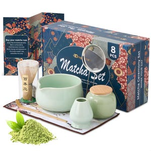 May include: An 8-piece Matcha Ceremony Set, including a whisk, bowl, scoop, and sifter. The set features a light green ceramic bowl and accessories, with a box displaying the words "Matcha Ceremony Set". A pile of green matcha powder and fresh leaves are also visible.