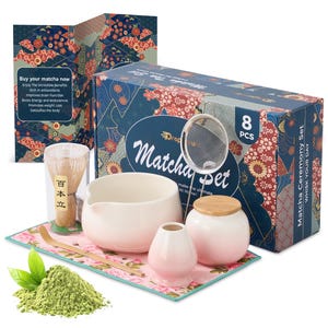 May include: An 8-piece Matcha Ceremony Set, including a bowl, whisk, scoop, sifter, and storage jars. The set is presented on a floral patterned mat, with a box featuring the text "Matcha Ceremony Set". A brochure reads "Buy your matcha now".
