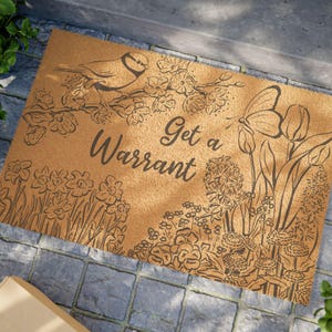 May include: A set of three ceramic mugs with a speckled, matte finish. Each mug features a different color: light blue, cream, and gray. The mugs have a simple, modern design and a comfortable handle.