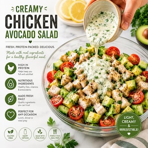 May include: A glass bowl of creamy chicken and avocado salad. The salad contains diced chicken, avocado, cucumber, and cherry tomatoes, with a creamy dressing being poured over it. The image text says "Creamy Chicken Avocado Salad."