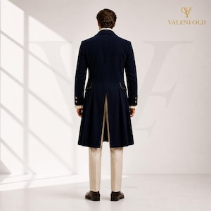 May include: A navy blue long coat with gold trim and buttons, paired with cream-colored trousers. The coat features a split back and is part of a formal outfit. The Valenfold logo is visible in the upper right corner.