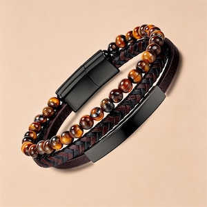 May include: A multi-layered bracelet with tiger eye beads, braided leather, and a black clasp. The bracelet has a dark brown leather band and a black metal plate. The beads are a mix of brown and gold.