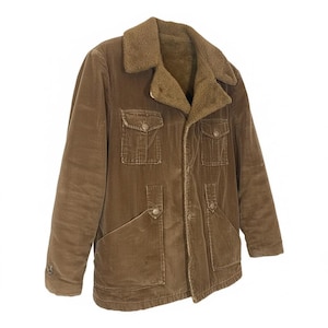 May include: A brown corduroy jacket with a faux fur collar and lining. The jacket has four front pockets and button closures. The jacket is a medium brown color.