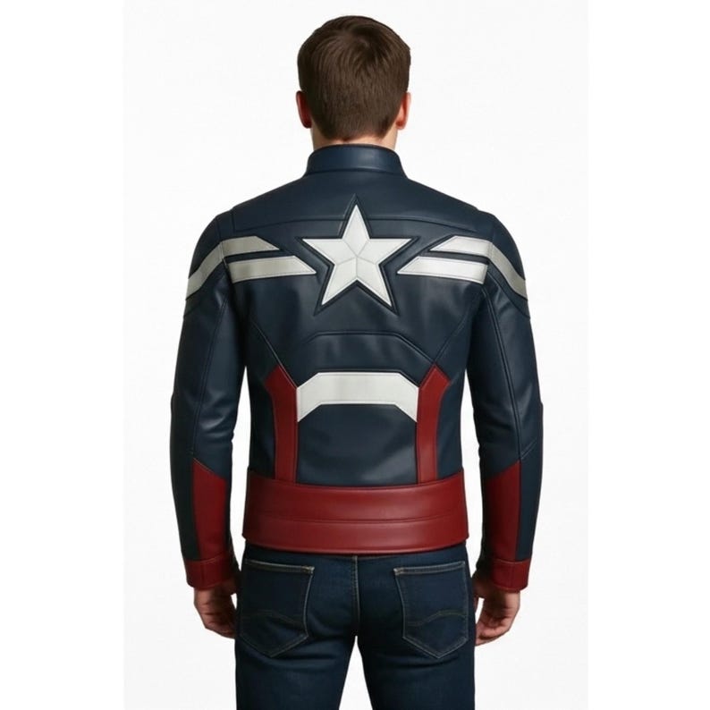 May include: Navy blue leather jacket with a white star emblem on the back. The jacket features silver accents on the shoulders and red detailing on the lower back and sleeves. A red band wraps around the waist.