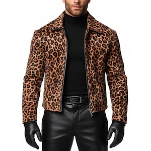 May include: A brown and black leopard print jacket with a black zipper closure. The jacket has a collar and is worn with a black turtleneck, black leather pants, and black gloves.
