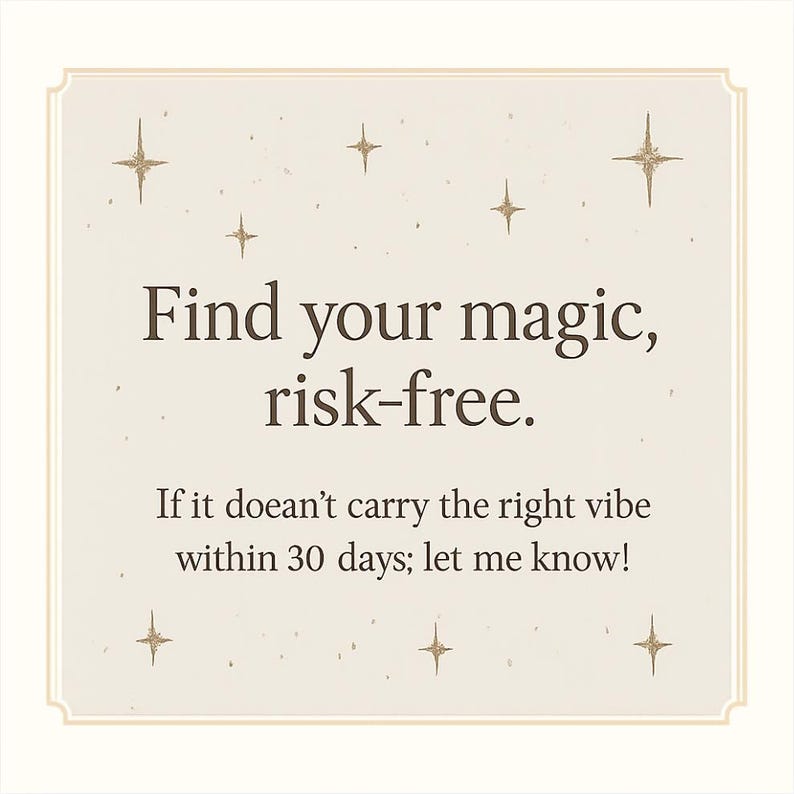 May include: A cream-coloured card with the text "Find your magic, risk-free." and "If it doean't carry the right vibe within 30 days; let me know!" in a dark brown font. The card is decorated with gold starbursts.