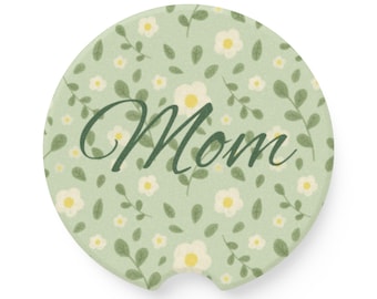 Posavasos para coche con diseño floral y texto "Mamá" / Posavasos para coche de esteatita