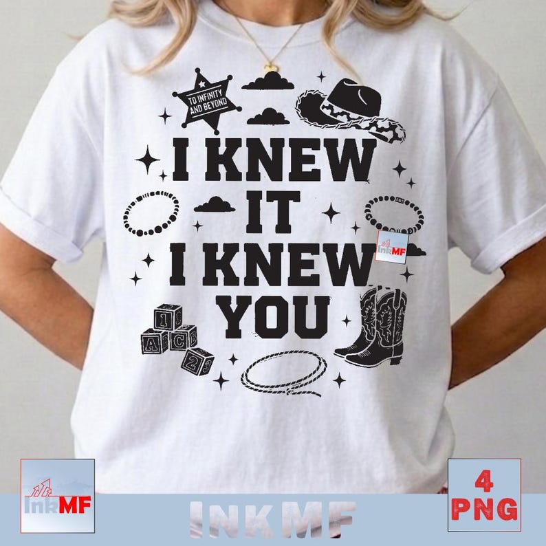 May include: A white short-sleeved t-shirt featuring a black graphic print with the text I KNEW IT I KNEW YOU. The design includes a sheriff star, cowboy hat, cowboy boots, alphabet blocks, a lasso, clouds, and stars scattered around the text.