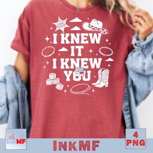 May include: A red short-sleeved t-shirt featuring white graphic prints including a sheriff star with the text TO INFINITY AND BEYOND, a cowboy hat, cowboy boots, a lasso, alphabet blocks, and the text I KNEW IT I KNEW YOU surrounded by stars.