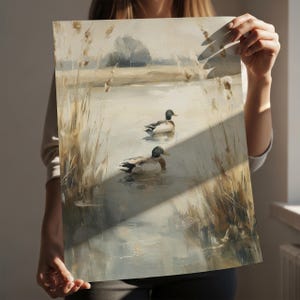 Serene oil painting of duck silhouettes for entryway — soft color palette and tranquil vibe create an inviting atmosphere.